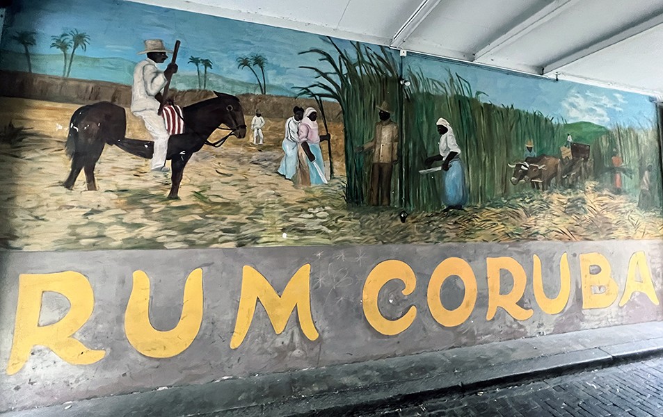murals located in the old Rum factory in Basel depicting quotidian life in rural 19th century Jamaica. The large panel illustrates scenes from a sugarcane plantation